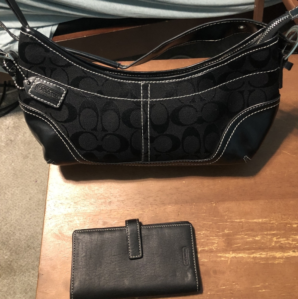 Coach black pocketbook with card holder